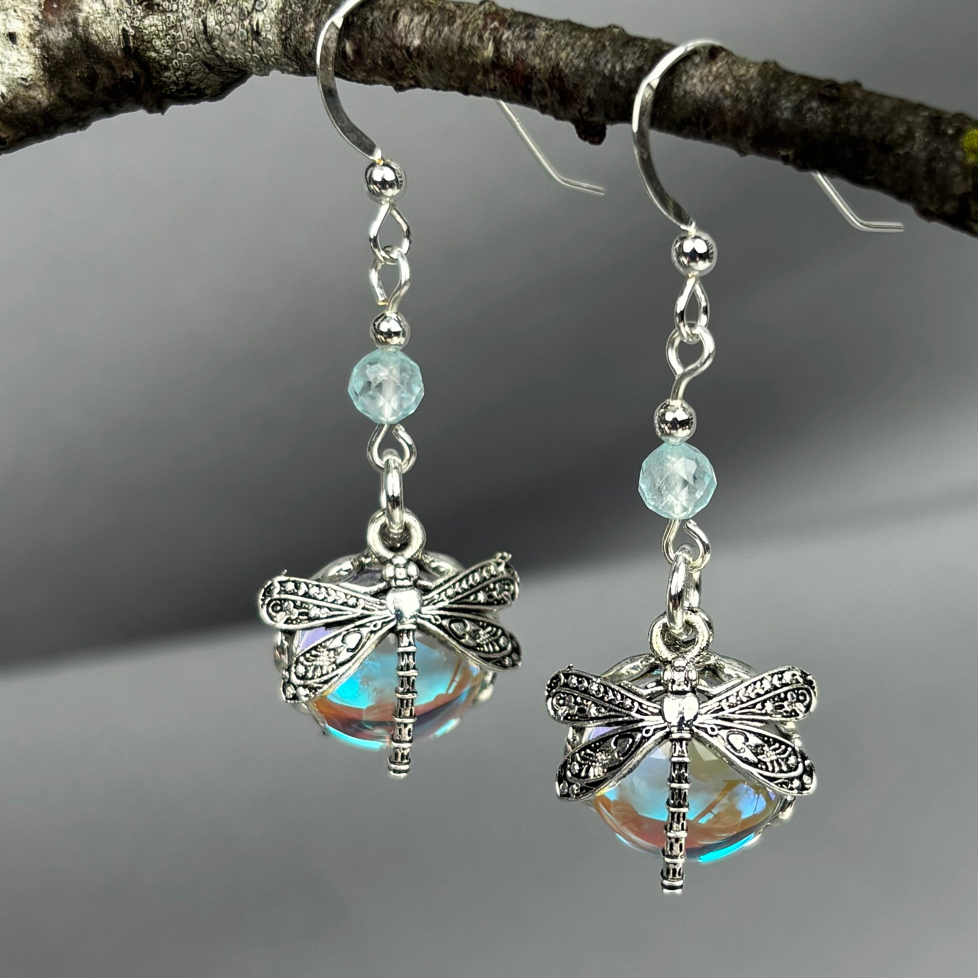4mm faceted aquamarine gemstone 
 with metal dragonfly on glass dome earrings.