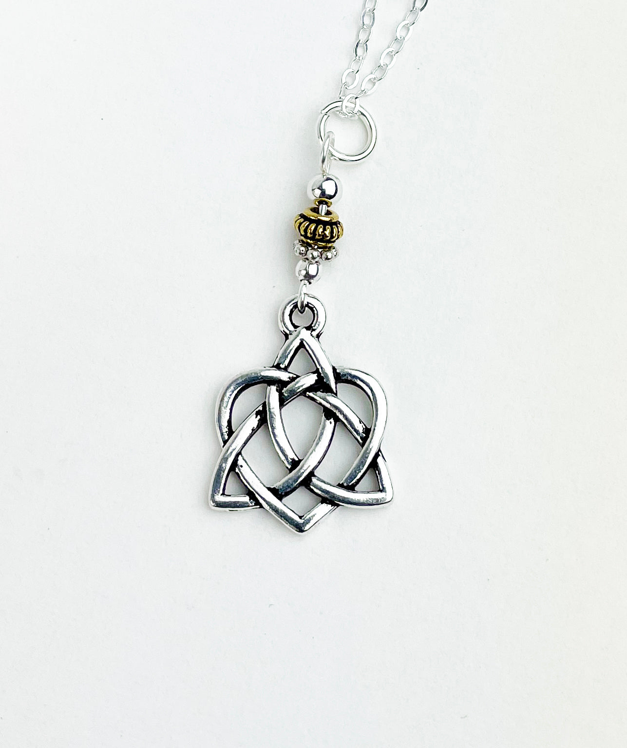 Trinity Knot with Intertwined Heart with Gold Details
