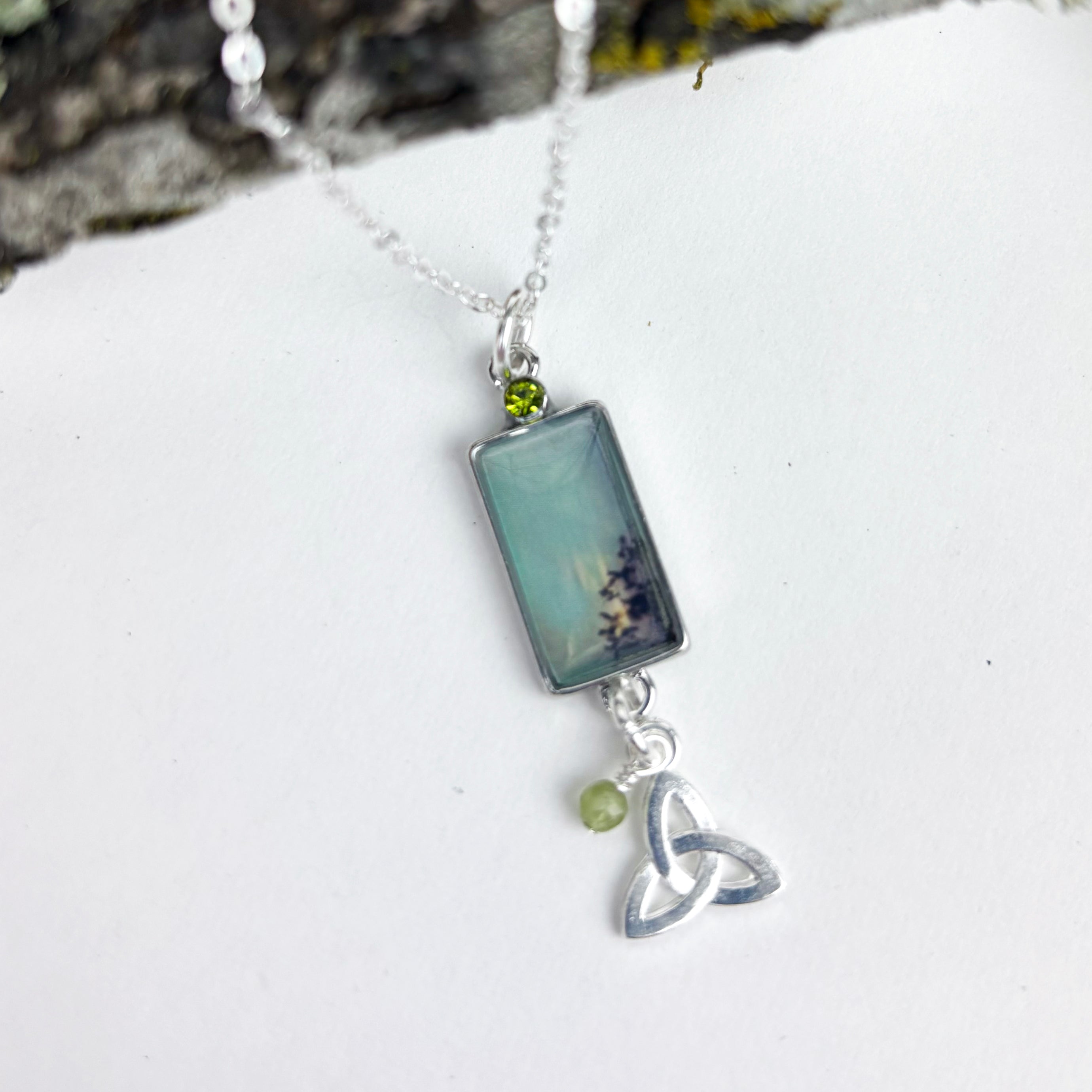 Rectangle cabochon with trinity knot and Peridot
