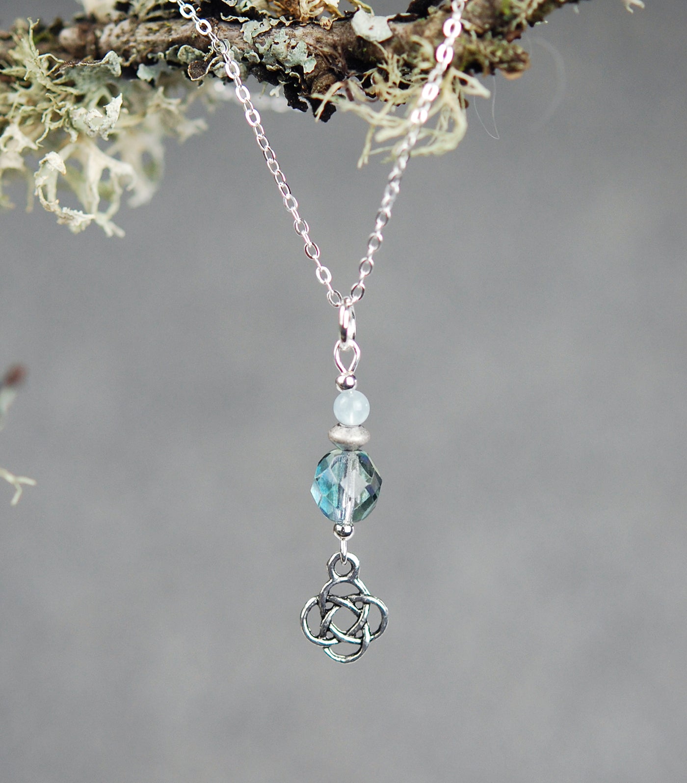 Aquamarine with Glass Beads and Round Knot