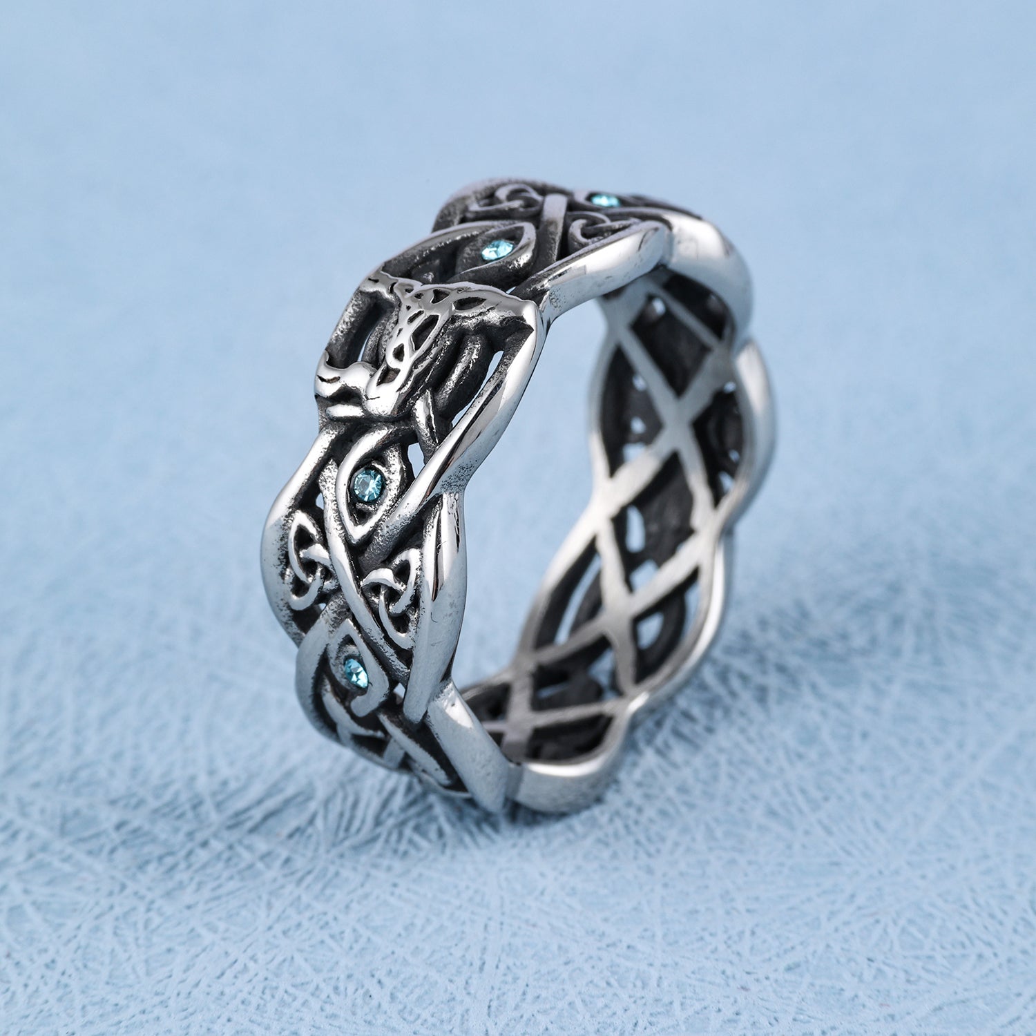 Open Celtic Knot with Faceted Teal Accents Band
