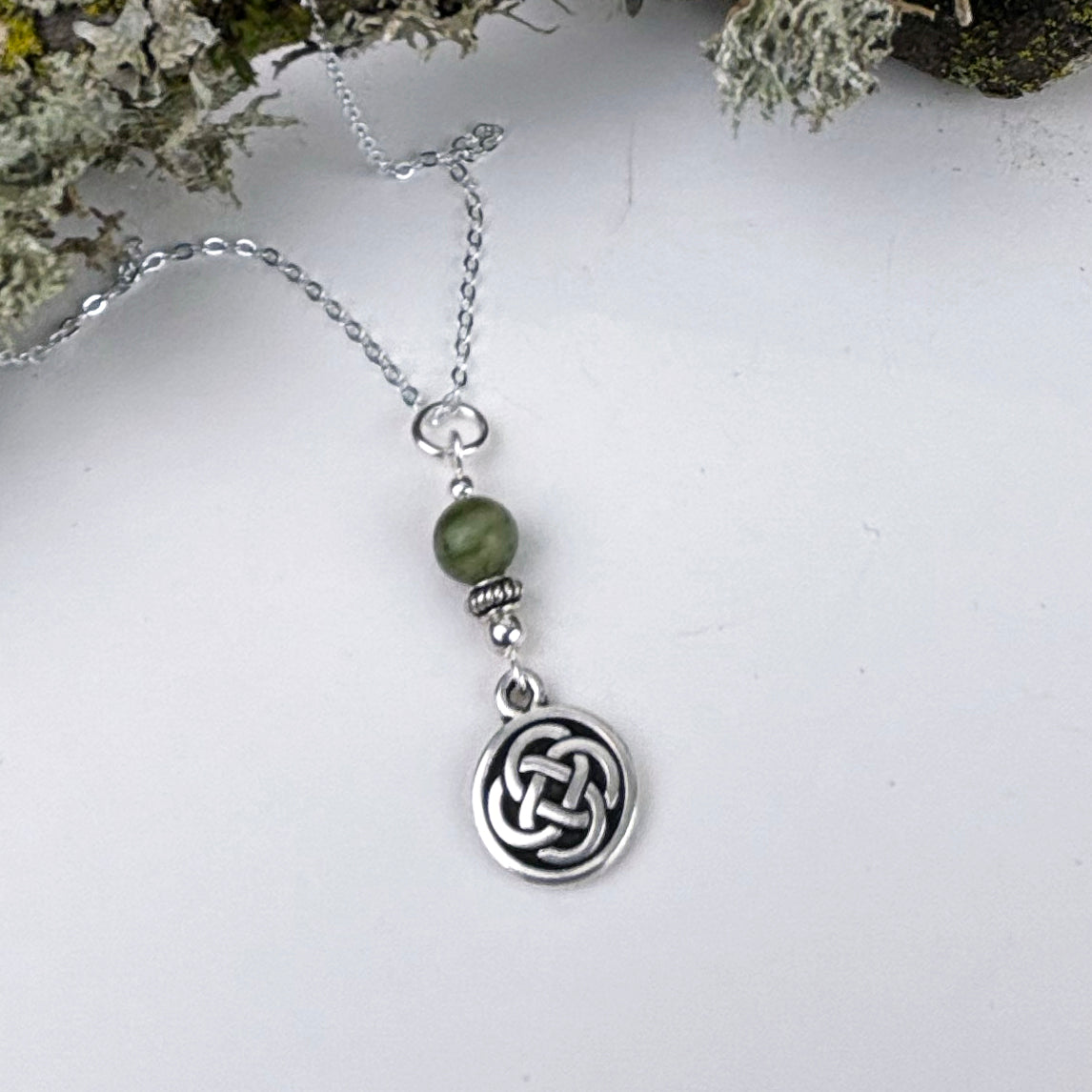Connemara marble Rondelle with Celtic Knot Coin