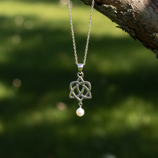 Freshwater Pearls with the Trinity Knot with intertwined heart.