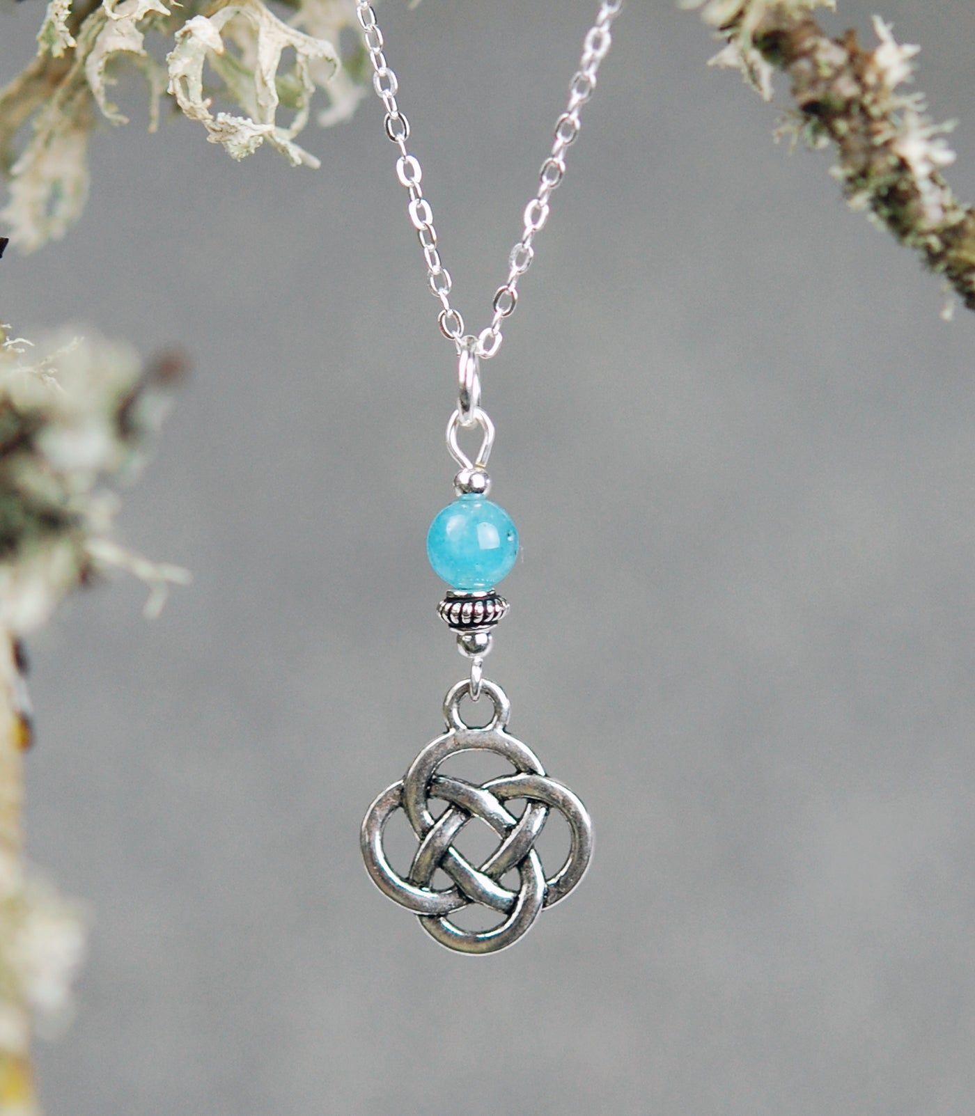Aquamarine gemstone with Round Celtic Knot