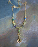 Sacred Numbers Necklace in Antique Gold