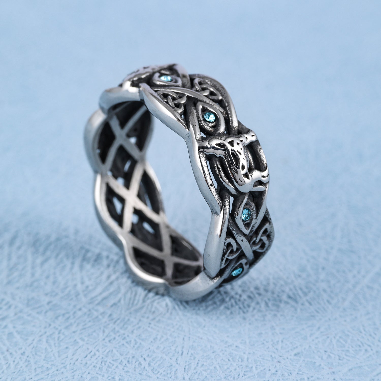 Open Celtic Knot with Faceted Teal Accents Band