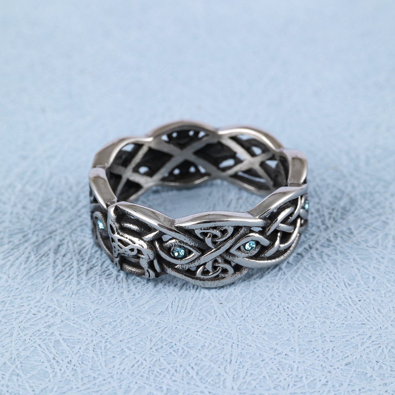 Open Celtic Knot with Faceted Teal Accents Band